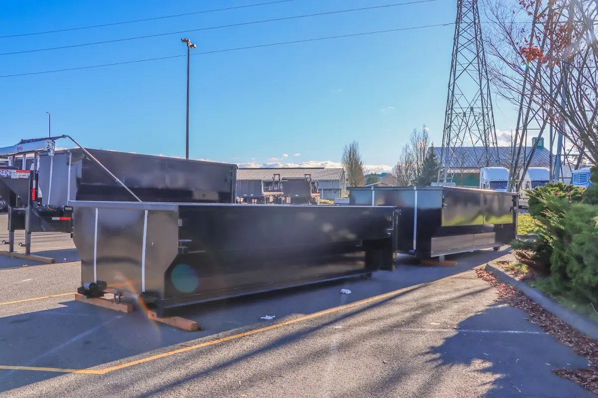 Roll-off dumpster ready for waste disposal at job site for Yard Waste Dumpster Rental in Sandy Springs